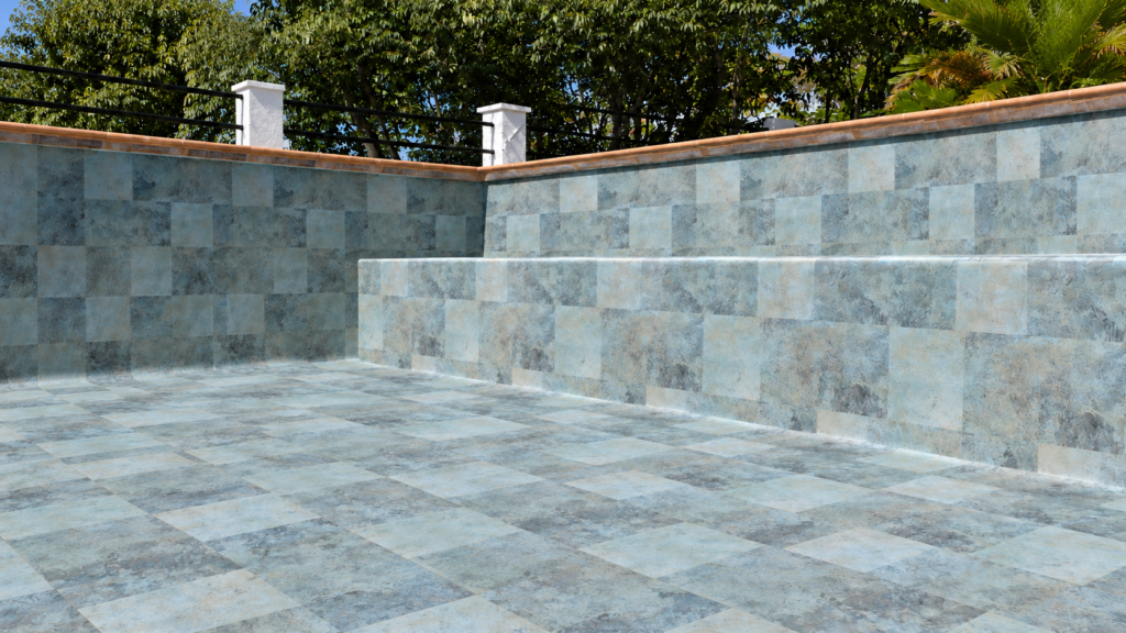 Piscina revestida con lámina armada de efecto piedra gris, con suelo, paredes y banco terminados.